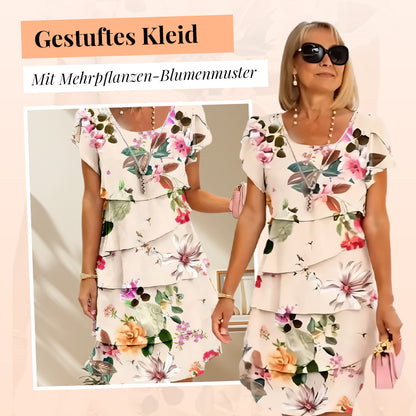 Kaskadenkleid mit Blumenmuster und mehreren Pflanzen