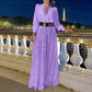 Eleganter Jumpsuit mit V-Ausschnitt, langen Ärmeln, weitem Bein und Paillettenbesatz