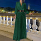Eleganter Jumpsuit mit V-Ausschnitt, langen Ärmeln, weitem Bein und Paillettenbesatz