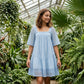 Damenkleid mit Karree-Ausschnitt und Smokdetails