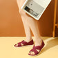 Bequeme, einfarbige, flache Sandalen mit Fliege