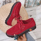 Flache Damenschuhe mit Schnürung und Ziernähten