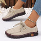 Flache Damenschuhe mit Schnürung und Ziernähten