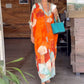 Lockeres langes Kleid mit Blumenmuster und halblangen Ärmeln