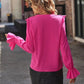 Elegante Bluse mit V-Ausschnitt und ausgestellten Rüschenärmeln