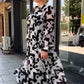Damen elegantes Kleid mit abstraktem Muster und fließendem Schnitt