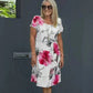 Kaskadenkleid mit Blumenmuster und mehreren Pflanzen