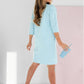Kleid mit Rundhalsausschnitt und 3/4-Ärmeln und Taschen