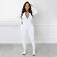 Einfarbiger nahtloser Jumpsuit mit halbem Reißverschluss