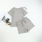 Damen einfarbiges Set aus strukturiertem Stoff: Kurzarm-Oberteil und Shorts mit Kordelzug