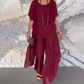 Damen-Set aus asymmetrischem Oberteil und lockerer Hose