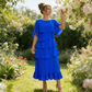 Elegantes Kleid mit gestuften Rüschenärmeln