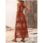 Elegantes Neckholder-Kleid mit Blumenmuster und Beinschlitz