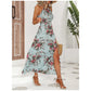 Elegantes Neckholder-Kleid mit Blumenmuster und Beinschlitz