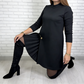 Elegantes Kleid mit langen Ärmeln und Plissee