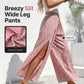 Damenhose mit geraffter Taille, weitem Bein und Schlitz
