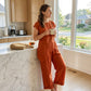 🌺2-teiliges Set aus Oberteil mit asymmetrischem Saum und Hose für Damen