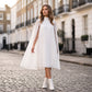 Mini-Kleid für Damen mit Rundhalsausschnitt und Cape-Ärmeln