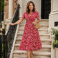 Elegantes Damenkleid mit V-Ausschnitt und Blumendruck