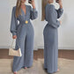 Elegante Jumpsuit mit V-Ausschnitt, weitem Bein und Gürtel