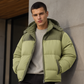 🎯💥 50% Rabatt + Gratis Versand! 🚚✨Herren Winter-Steppjacke mit Kapuze im Color-Block-Design