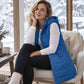 Mittellange, gesteppte Damen-Weste mit Kapuze – warm & bequem