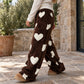 Damen-Plüschhose mit Herzprint und weitem Bein