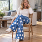 Damen High-Waist Jeans mit Polka-Punkt Muster und ausgestellter Form